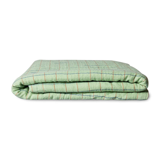 green checkered fleece blanket
