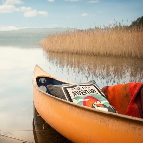 kayak with adventure throw pillow