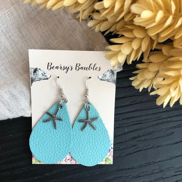 aqua blue, leather teardrop earrings with a silver sea star