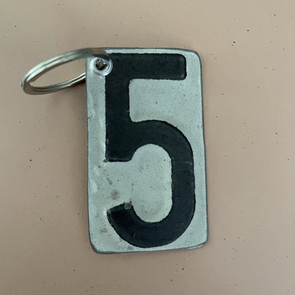 black  number 5 keychain from recycled license plate