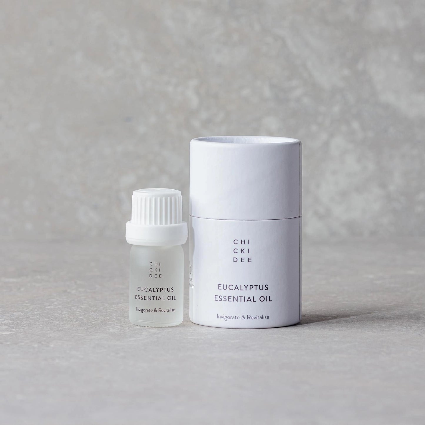small glass bottle with eucalyptus essential oil