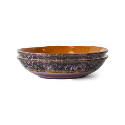 retro style deep plates with burnt orange inside and purple tones outside reactive glaze