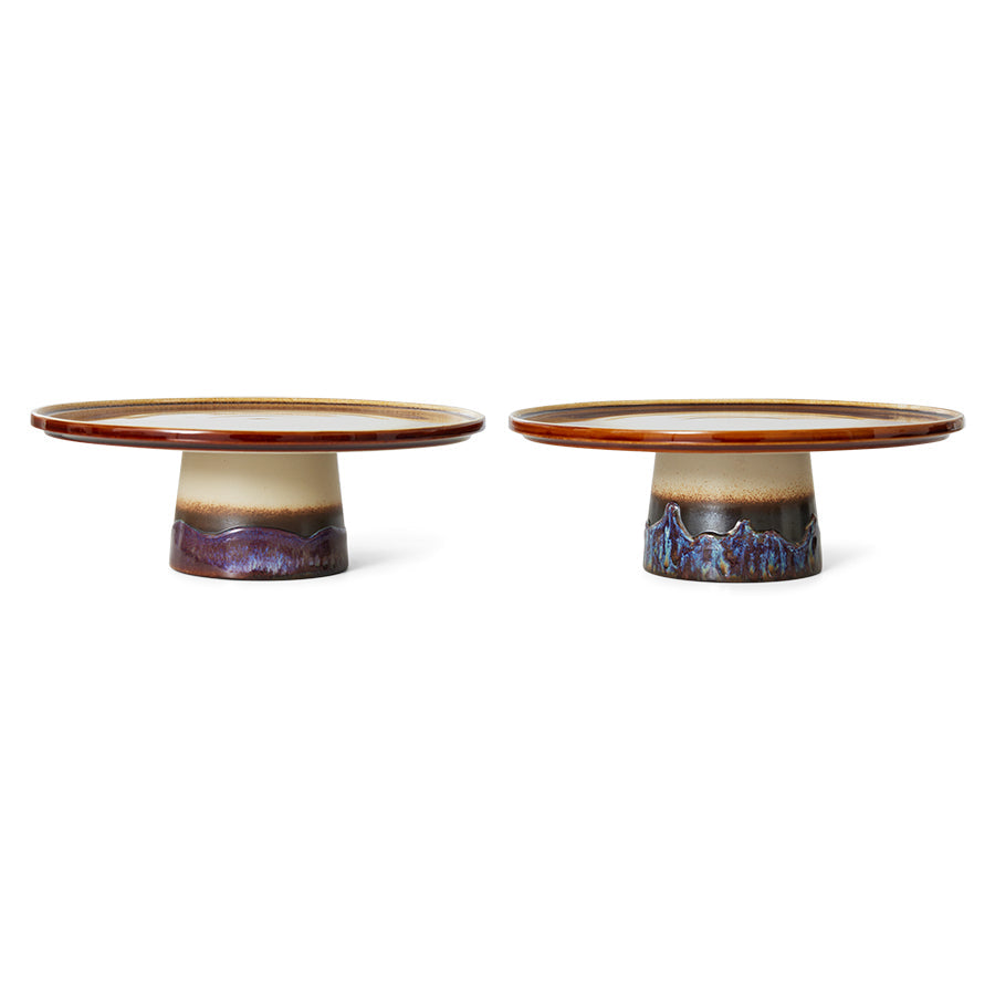 two retro style cake stands in brown hues with variations in finish