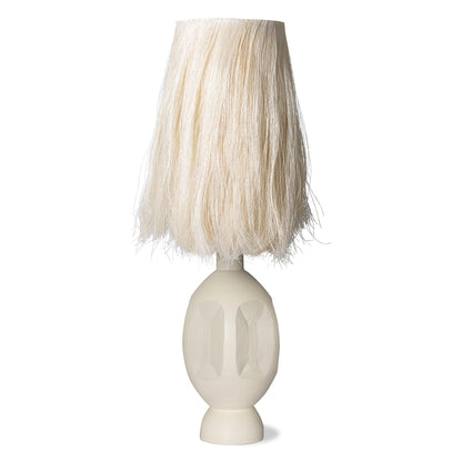 tall sand colored table lamp with stoneware base and abaca fiber shade