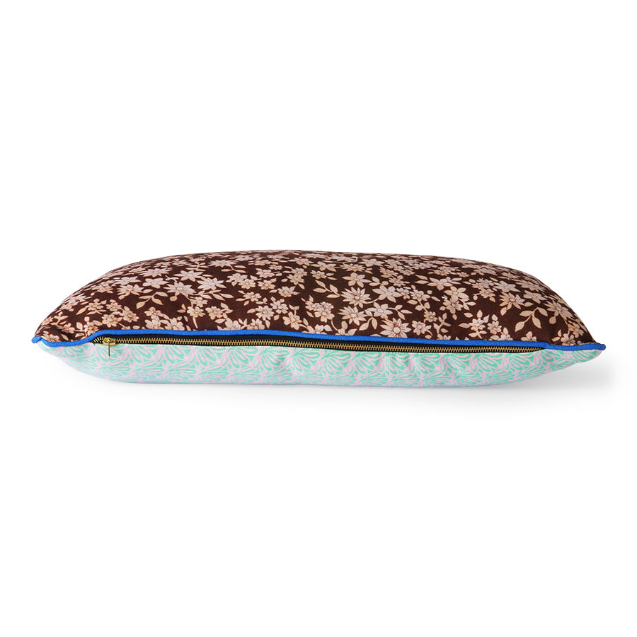 double sided lumbar pillow in brown and green colors with blue trim