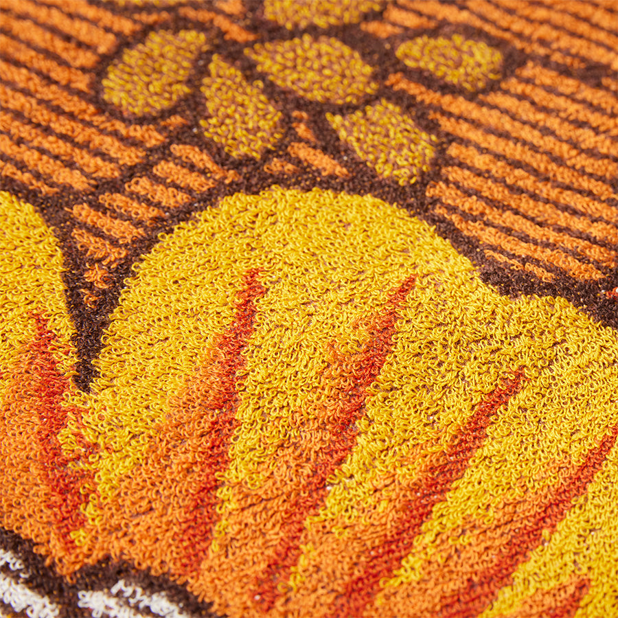 detail of retro style large beach towel with flower design