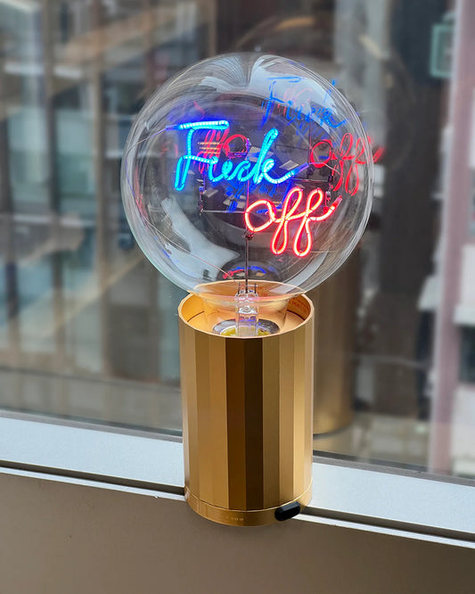 portable gold lamp base with large lightbulb with blue and red