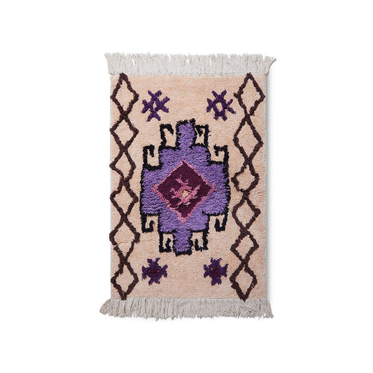 salmon colored bath mat rug with brown and purple design