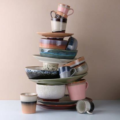 stack of tableware in 1970 retro style