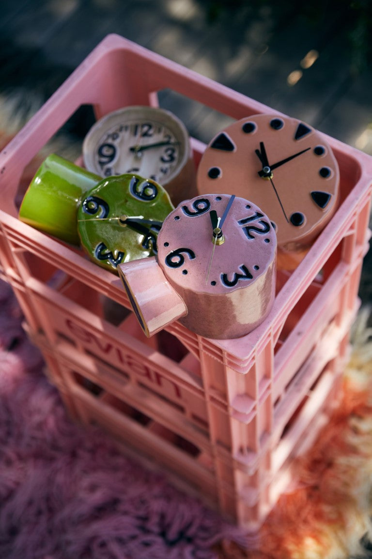 green ceramic retro style desk clock in crate with other color clocks