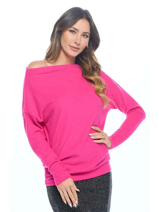 woman wearing pink off shoulder knit top on black glitter skirt