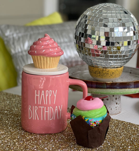 pink mug with cupcake lid and happy birthday inscription