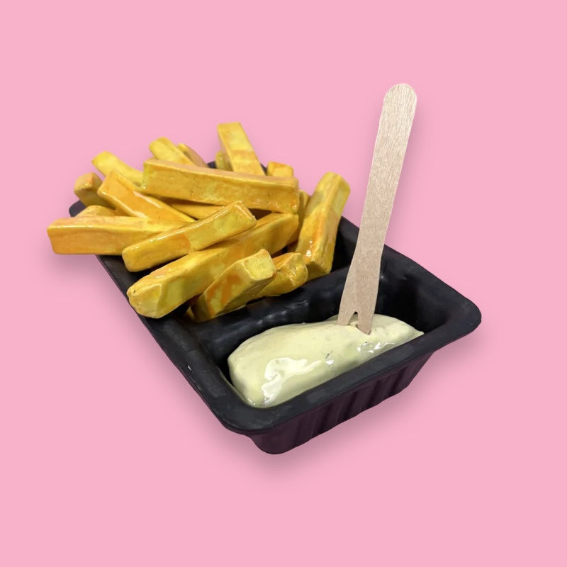 ceramic wall sculpture of a traditional Dutch snack fries with mayonnaise 