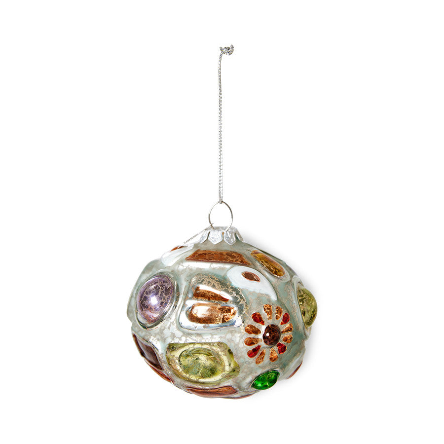 irregular shaped glass Christmas ornament with colors and silver paint