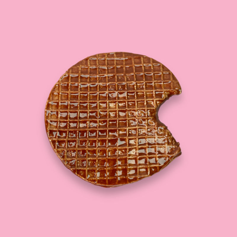 ceramic wall sculpture of a Dutch waffle cookie