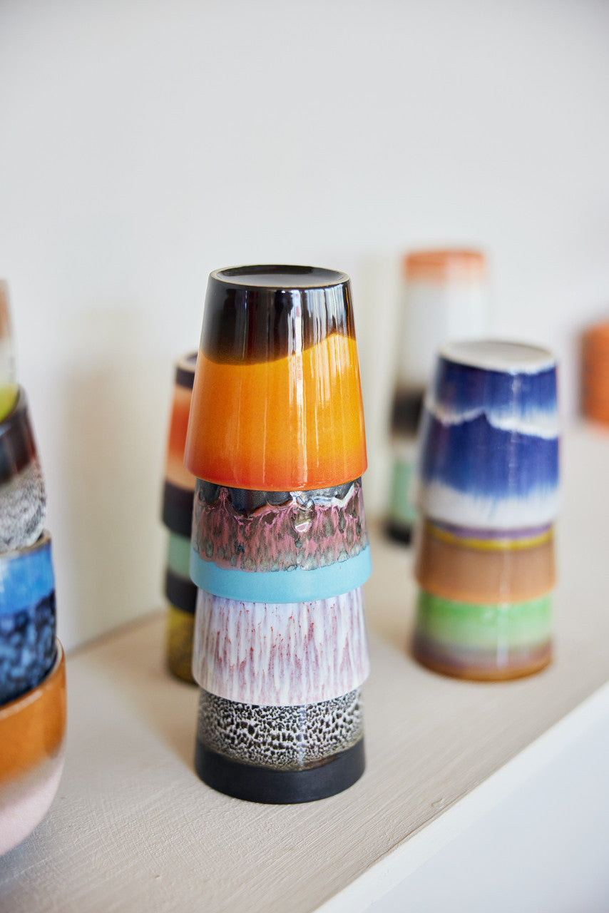 6 stoneware tumbler mugs in orange, purple, brown and blue tones with a shiny finish