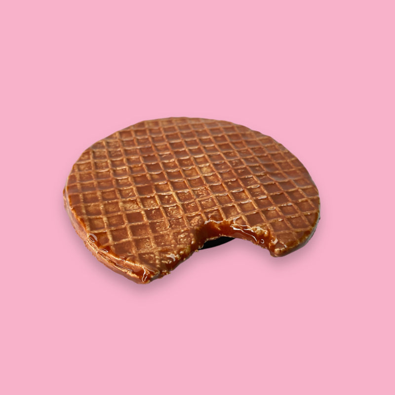 ceramic wall sculpture of a Dutch waffle cookie