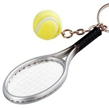key chain of tennis racket and tennis ball