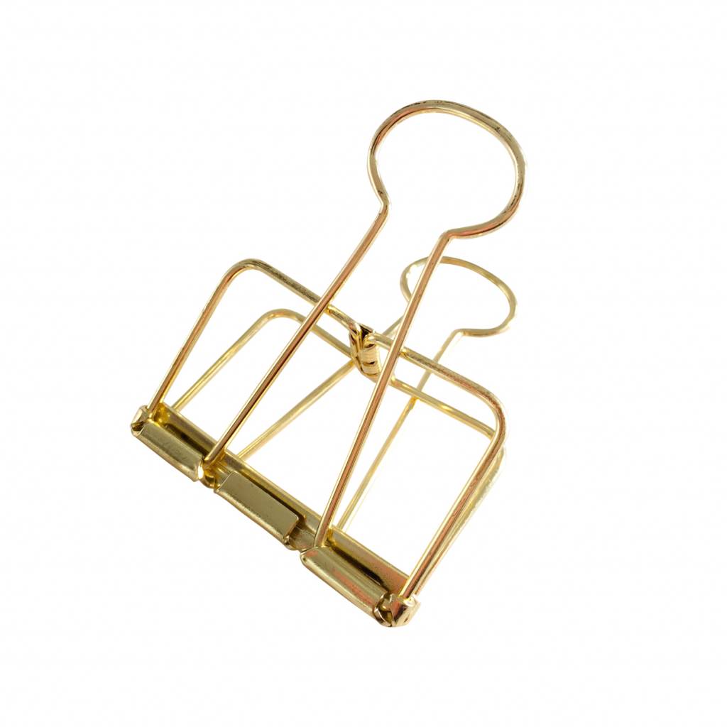 large metal binder clip in gold color