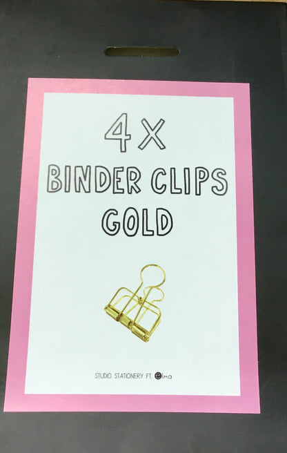 gift packaging with 4 gold colored binder clips