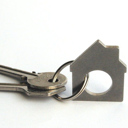 key chain holder made of recycled metal in shape of a house