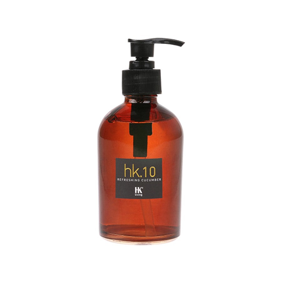liquid soap in amber glass bottle with black pump