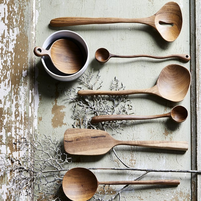 set of organically shaped teak wooden spoons