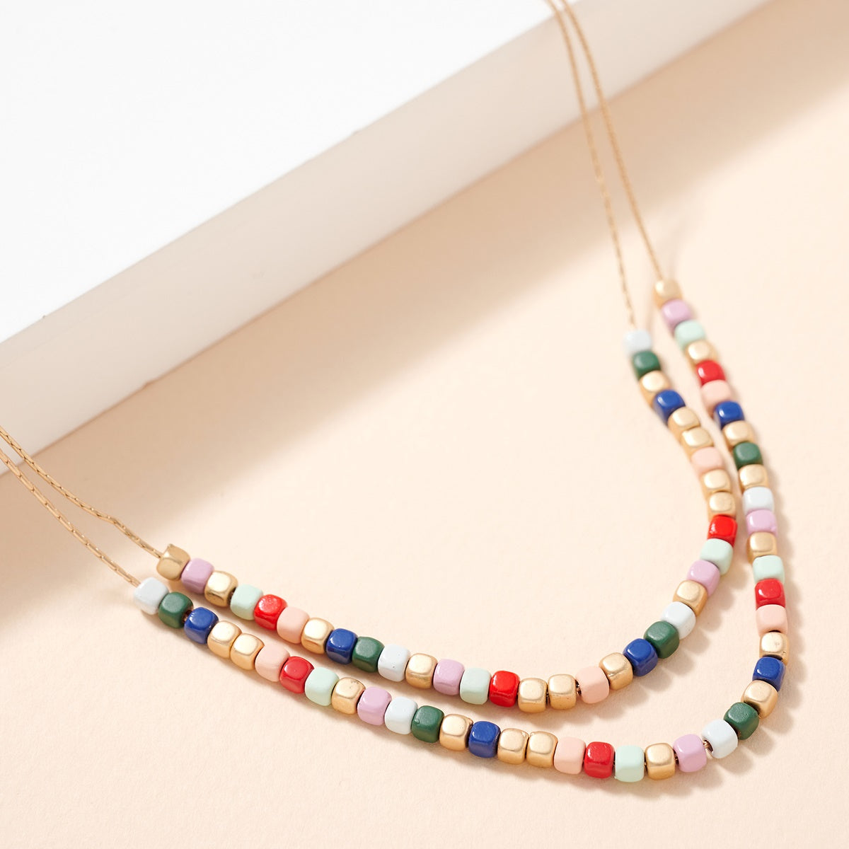 Double layered square bead necklace