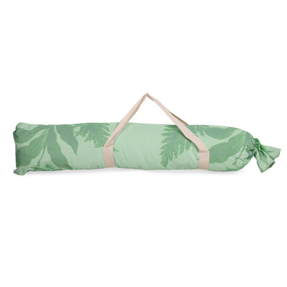 green fabric carrying bag for green fringe beach umbrella with wooden pole