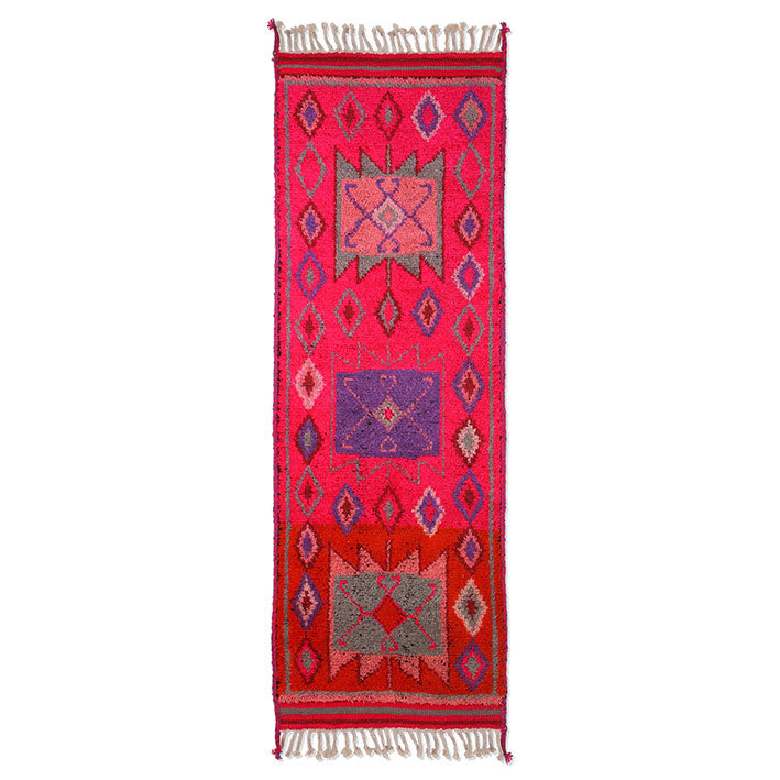 bright pink woolen runner with purple red and gray patterns
