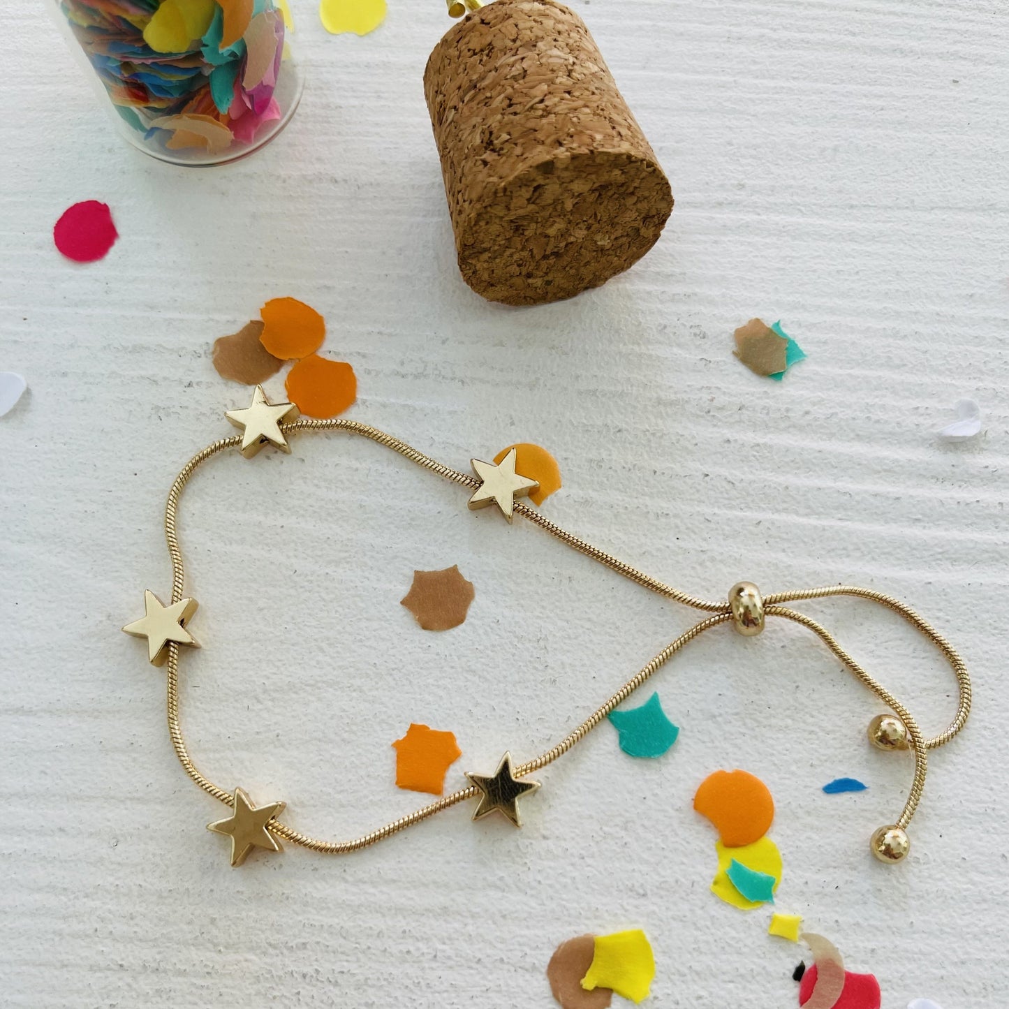 gold platted star brace let with confetti