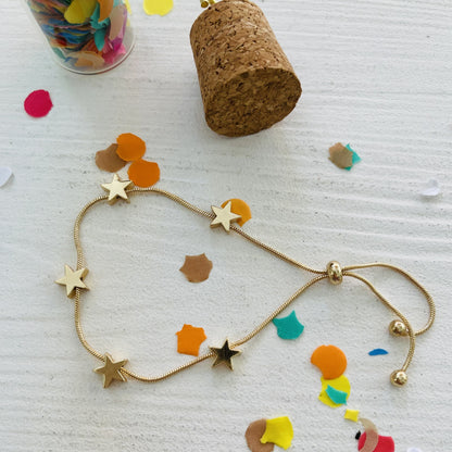 gold platted star brace let with confetti