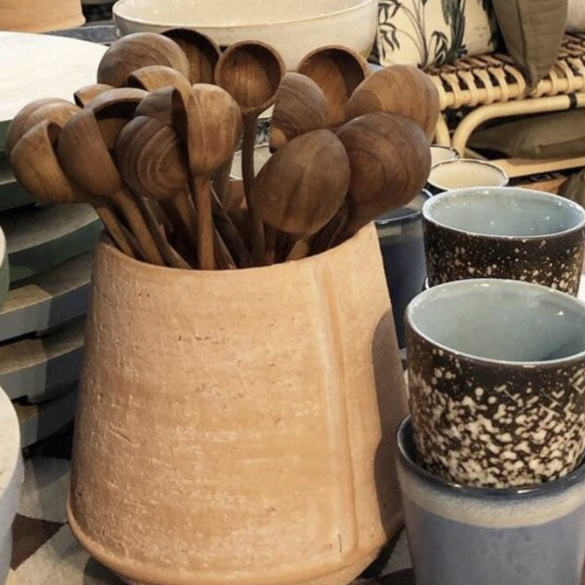 wooden spoons in terracotta pot