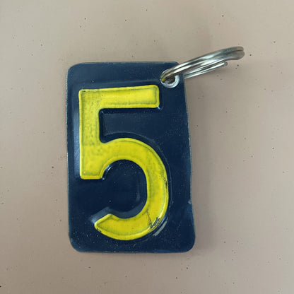 yellow number 5 keychain from recycled license plate 