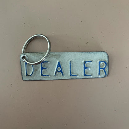 dealer cut out key chain fob from recycled license plate