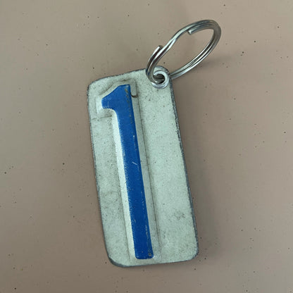 blue number 1 key chain from license plate