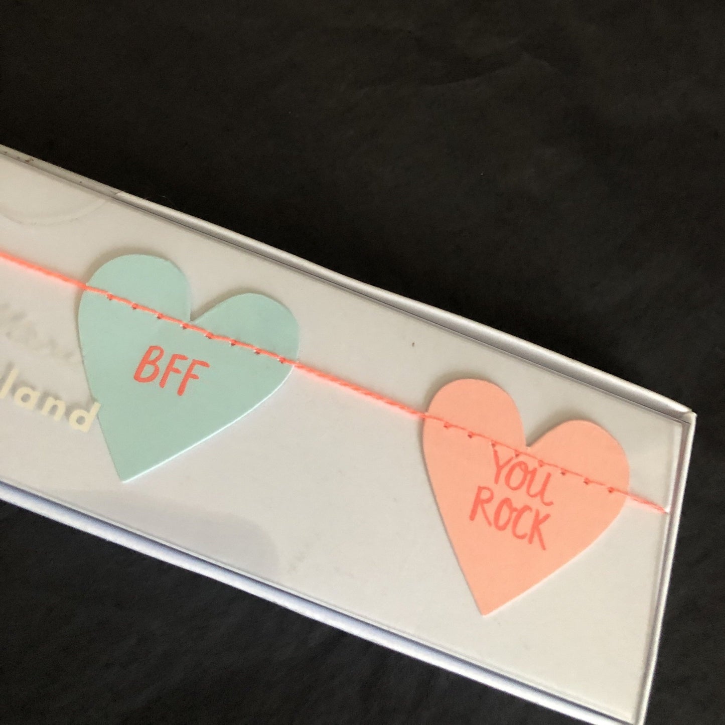 Best Friends Forever paper garland with neon colored hearts