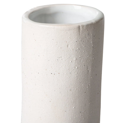 detail of white twisted shape stoneware vase object
