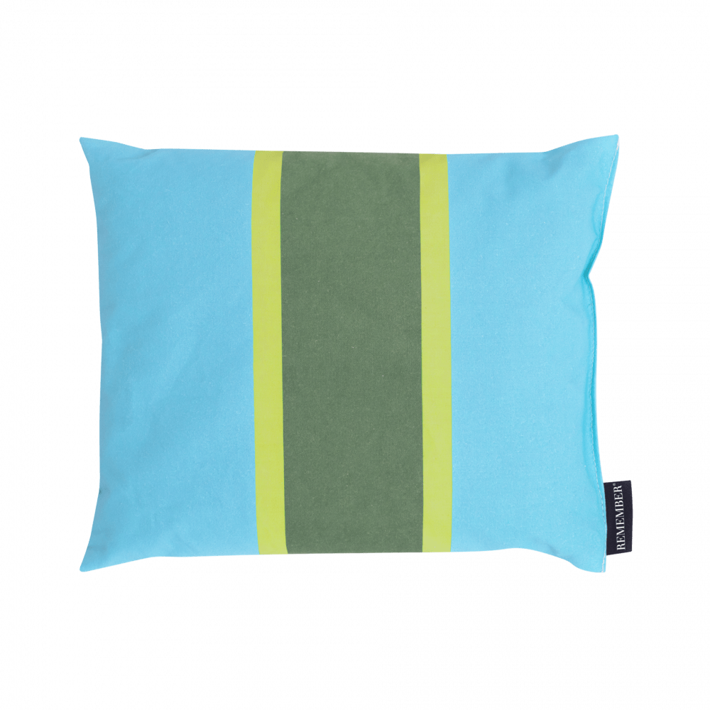 blue yellow and green wellness pillow filled with cherry stones