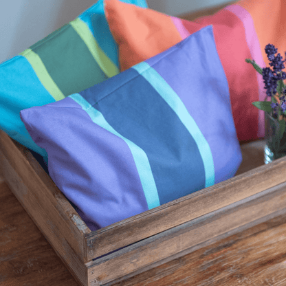 lilac and purple small accent pillow filled with lavender in a wooden box