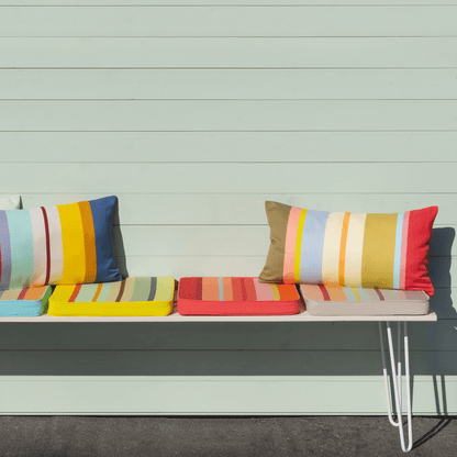 square striped seating cushion on balcony bench