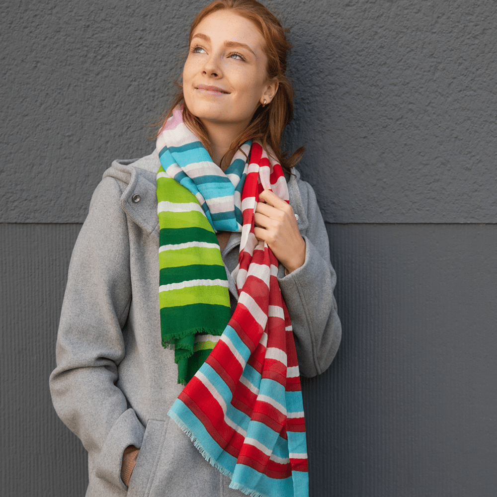 extra long colorful soft wool and viscose scarf worn with a grey coat