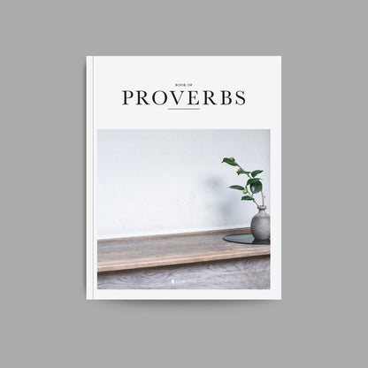 bible book Proverbds in paperback with serene photo on front cover