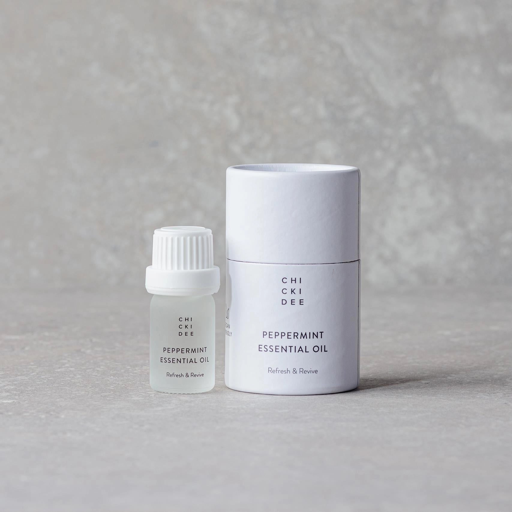 essential peppermint oil in a 5ml glass bottle with white cap and white box