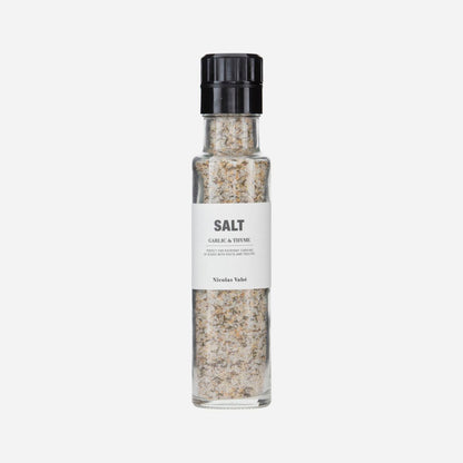 designer salt in glass grinder bottle infused with garlic and thyme