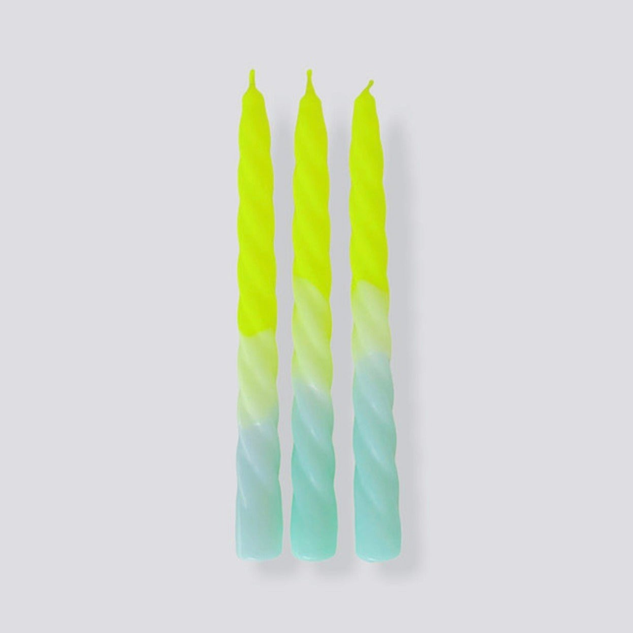 pink stories set of 3 dip dyed candles in yellow and blue