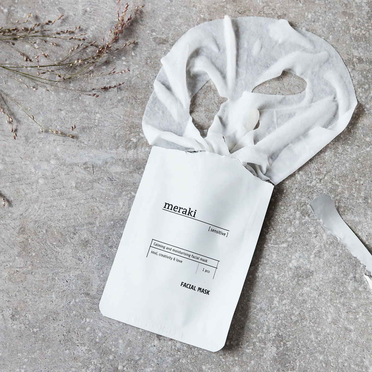 facial beauty mask in a white sachet