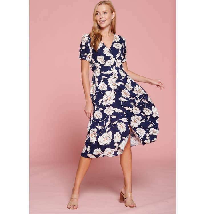 navy blue midi dress with large white flowers