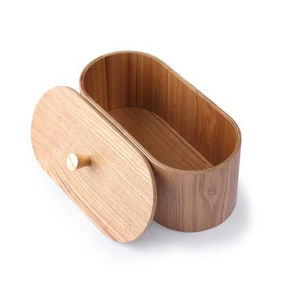 oval shaped brown wooden box with lid