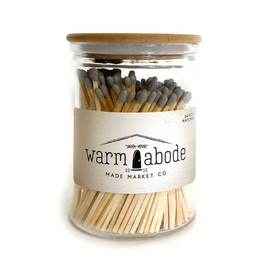 grey matches in a glass jar with lid